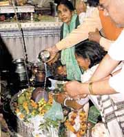 Devotees at Gauri Shankar Mandir in Chandni Chowk on the occasion of Maha Shivratri in the Capital on Wednesday. 