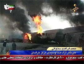 A frame grab taken from Iranian television shows a destroyed train wagon near the Iranian city of Nishapur