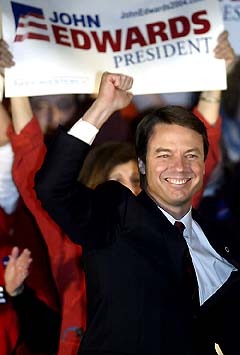 US Democratic presidential candidate Senator John Edwards celebrates during an election night rally