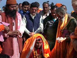 Sadhus and others bless Baba Rajinder Gir