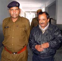 Anil Lekhi, Assistant General Manager, Haryana Financial Corporation, being produced in a court