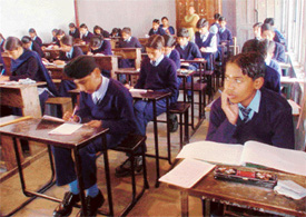 Class VIII students appear for their annual examination conducted by the Punjab School Education Board at Government Senior Secondary School