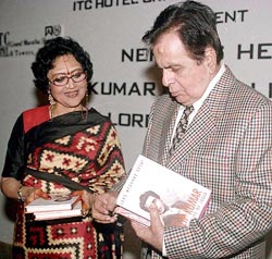 Bollywood thespian Dilip Kumar and former actress Vyjayanthimala Bali take a look at the book, �Nehru�s Heroes: Dilip Kumar in the Life of India,� at its release function 