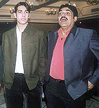 Senior Delhi and District Cricket Association official Ravi Khanna with Akash Chopra at a reception hosted by the National Cricket Academy vice-chairman C. K. Khanna in New Delhi.