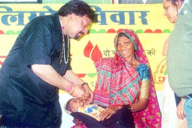 An infant being administered pulse polio drops at a camp organised by Gobhania Nirog Dham in the Capital on Sunday