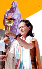 Congress President Sonia Gandhi hands over �Jagriti Jyot� to Youth Congress leaders to spread the message of peace and harmony