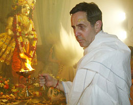 Alfred B. Ford, great-grandson of Henry Ford, prays during a ceremony to install statues of Hindu deities at the head office of International Society for Krishna Consciousness in Mayapur