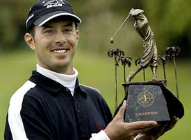Mike Weir of Canada poses with the trophy after posting a one-stroke victory over Shigeki Maruyama of Japan in the final round of the Nissan Open