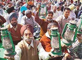 Employees of the Electricity Department and other departments of the union territory hold a rally in support of their demands in Chandigarh
