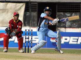 India U-19 captain Ambati Rayudu tries to hit a reverse sweep as West Indies wicketkeeper Dinesh Ramdin looks on