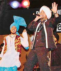 Punjabi singer Malkiat Singh performs at the Cyanide-2004