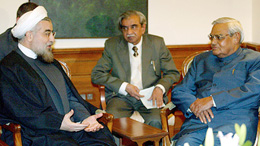 Prime Minister Atal Bihari Vajpayee talks with Iran's top nuclear negotiator and security council chief Hasan Rohani in New Delhi on Thursday.