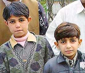 Afzal and Rohit on way to their home in Pakistan.