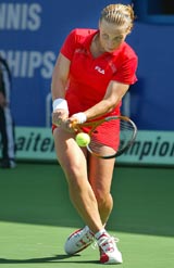 Russia's Svetlana Kuznetsova returns to Japan's Ai Sugiyama during their semifinal match at the Dubai Open in Dubai 