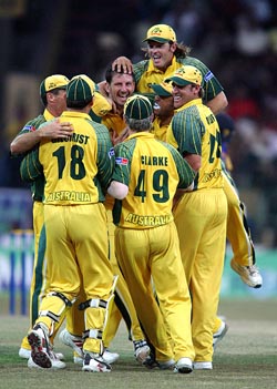 Australian bowler Michael Kasprowicz is congratulated by teammates after he dismissed Sri Lankan opener Sanath Jayasuriya