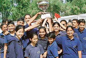 Jubilant students of Patiala House who won the overall trophy in the 25th annual athletics meet of Yadavindra Public School, Mohali