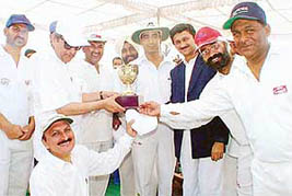 Chandigarh Administration XI cricket team that won the Samuel Banerjee Trophy at the Sector 16 cricket stadium in Chandigarh on Saturday. 