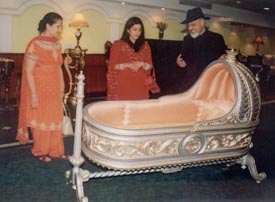 A crib gilded with 24-carat gold at a furniture exhibition in Ludhiana