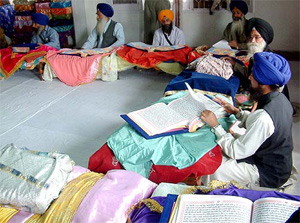 The final proofs of Guru Granth Sahib being read at Gurdwara Ramsar in Amritsar
