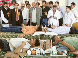 Volunteers donate blood at a camp organised by the Uttarakhand Yuva Manch at Garhwal Bhavan, Sector 29, in Chandigarh on Sunday.