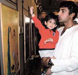 Cricketer Ajay Jadeja with his son at an exhibition of artistic maps of Jharkhand,Uttaranchal and Sikkim, organsied by Dastakari Haat Samiti and Central Cottage Industries Corporation in the Capital on Monday.