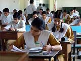 Students of class XII appear in their annual examinations