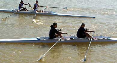 Yogita Yadav and Shilpa Garud (front) of Maharashtra relax after winning heat three of the double sculls event in the 24th Open National Rowing Championship at Sukhna Lake, Chandigarh