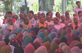 Former Himachal Chief Minister Prem Kumar Dhumal surrounded by party workers at a meeting at Mahre