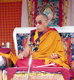 Tibetan spiritual leader the Dalai Lama addresses a gathering