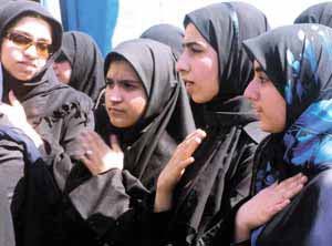 Shia women beat their chest during the Moharram procession in Old Delhi area in the Capital on Tuesday.