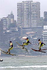 Members of Stars of Florida from the US participate in a water ski show as part of the F1 World Powerboat Championship in Mumbai 