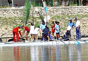 Rowers get ready for their events at the 24th Open National Rowing Championship at the Sukhna Lake in Chandigarh