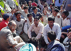 Mr Amrit Nagpal, secretary, DMCH managing society, being gheraoed by employees of the DMCH