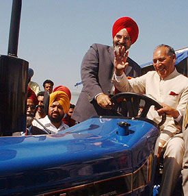 Punjab Governor Justice O.P. Verma on a tractor at the inauguration of kisan mela at Punjab Agricultural University