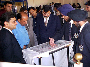The General Manager (Telecom), Mr K.C. Jindal, interacts with students during a poster-making contest, organised by the consortium of Electrical and Electronics Engineers, in Jalandhar on Thursday.