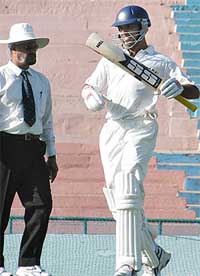 Yuvraj Singh of North Zone jubilates after scoring a century in the Duleep Trophy final against East Zone at the PCA Stadium in Mohali