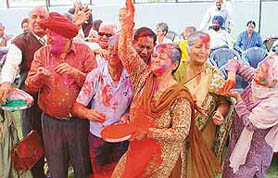 Senior citizens celebrate Holi at Sri Sathya Sai Old Age Home, Sector 30, Chandigarh, on Friday.