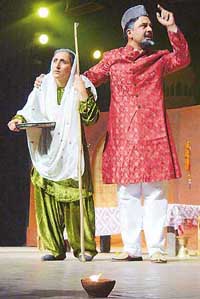 Madhuri Kataria and Sahib Singh in a scene from the play, "Jis Lahore nai vekheya oho jamya nai...", which was staged by Theatre Age for the visiting Pakistani delegation on Friday