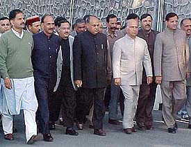 BJP leaders on the way to Raj Bhavan for submitting a "charge sheet" against the Congress government to the Governor in Shimla