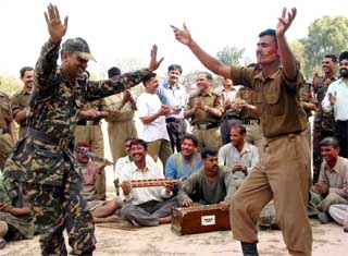BSF jawans celebrate Holi at a camp in the frontier area