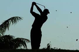 US golfer Tiger Woods tees off during the second round of the Dubai Desert Classic tournament 