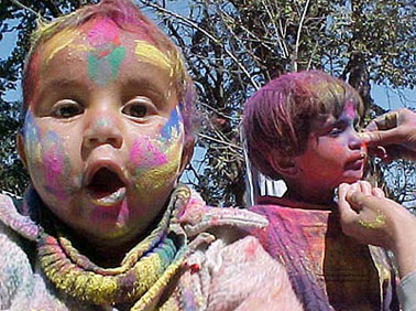 Kids celebrate Holi in Shimla on Saturday
