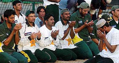 Pakistani players take a break for prayers during net practice for the coming Indo-Pak series 
