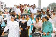 Members of the Mahila Congress hold a rally in Ludhiana on the occasion of International Women's Day on Monday