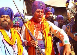 Nihangs take part in a Hola Mohalla procession at Anandpur Sahib 