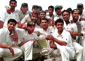 North Zone players pose with the trophy after they beat East Zone in the final of the Duleep Trophy 