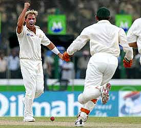 Australian leg-spinner Shane Warne celebrates after dismissing Sri Lankan batsman Sanath Jayasuriya