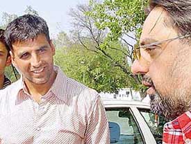 Bollywood actor Akshay Kumar is all smiles during his brief stopover at Chandigarh airport