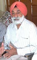 Col G. S. Sandhu, Chairperson of the Poohla Eviction Committee, addresses a Press conference in Amritsar