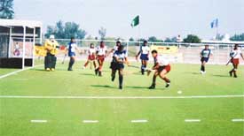 A match in progress between the teams of SAI, Chandigarh, and N-E Railways during the eighth All-India MPS Grewal Memorial Hockey Tournament 